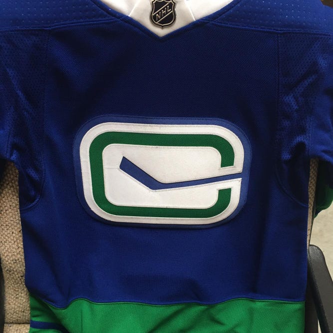 Vancouver Canucks Adult Size 52 Adidas  Jersey-New with Tags