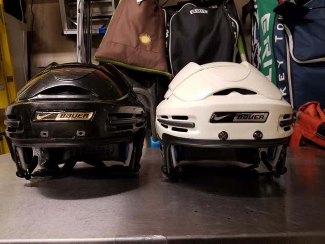 2 Used Medium Nike Bauer 9500 Helmets