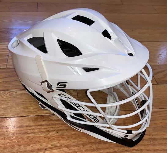 Used Cascade S Helmet. White shell, cage, chin& washer and strap. osfm. great condition