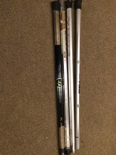 Four Used Lacrosse Shafts (Warrior & STX)