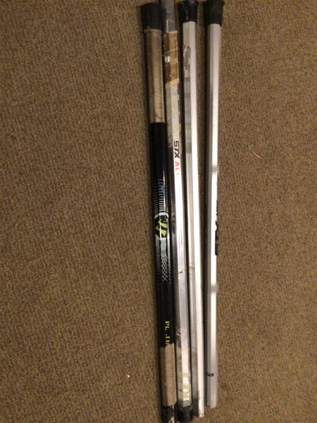 Four Used Lacrosse Shafts (Warrior & STX)