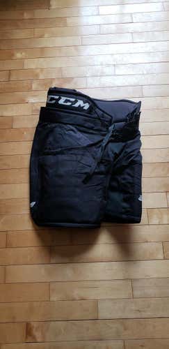 Black Used Senior Medium CCM hp31 Hockey Pants Charlottetown Islanders Pro Stock