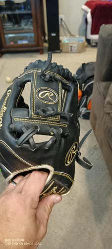 Used High School/College Rawlings Right Hand Throw Infield Heart of the Hide Baseball Glove 11.5"