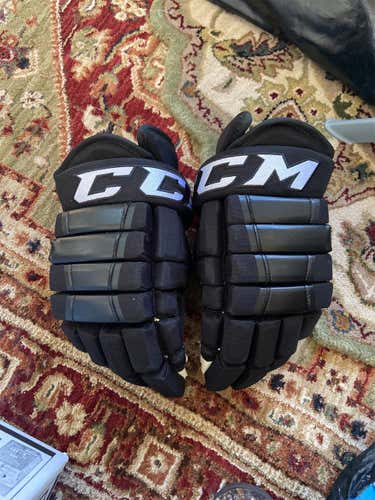 Black Senior CCM HG92XP 14" Pro Stock Gloves 4 Roll Pro
