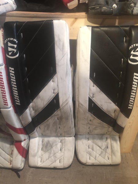 Used 32" Warrior Ritual G4 Goalie Leg Pads