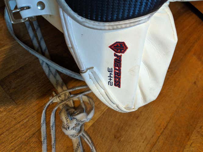 White Used Senior 34" Warrior Goalie Leg Pads Pro Stock