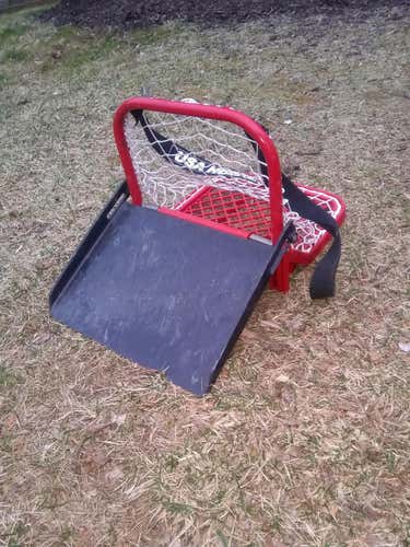 Mini hockey goal with ramp
