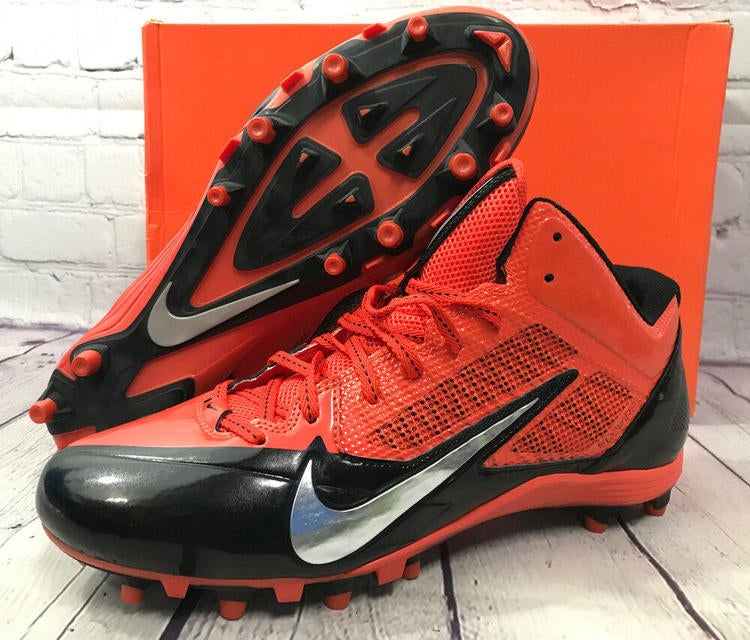 orange and black nike football cleats