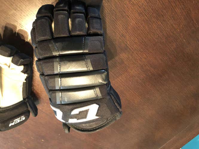 Black Used Senior CCM HG97 Gloves 13" Pro Stock