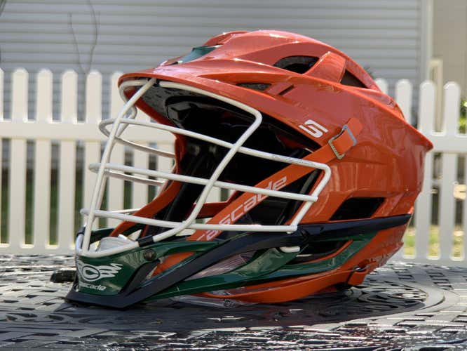 ***BRAND NEW!!!  Orange Adult Player's Cascade S Helmet - Green Chin.  NEVER WORN!!!