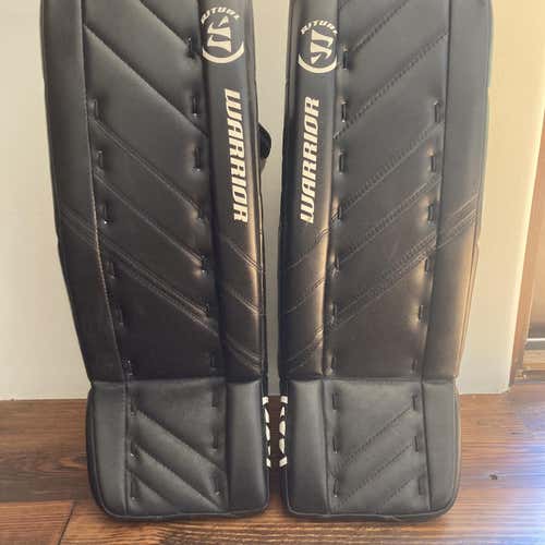 Black Junior 24" Warrior Ritual G4 Goalie Leg Pads