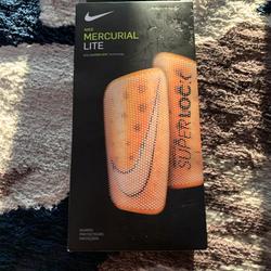 Orange Unisex Large Nike Mercurial lite Shin Guards