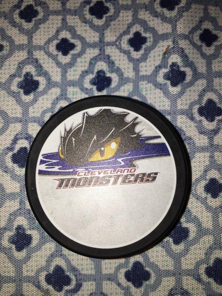 CLEVELAND MONSTERS A.H.L . HOCKEY PUCK 