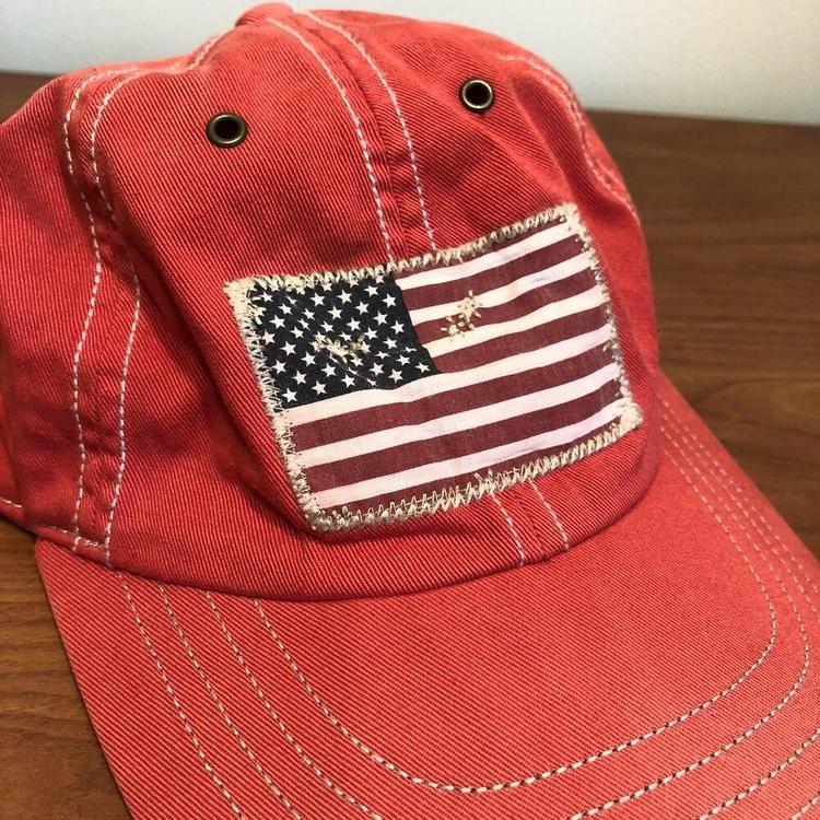 red polo hat