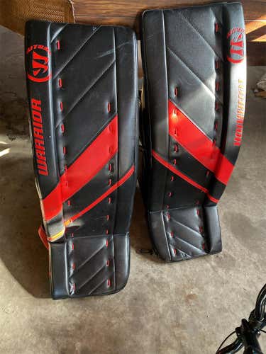 Black Senior 33" Warrior Ritual G4 SR Pro Stock Goalie Leg Pads