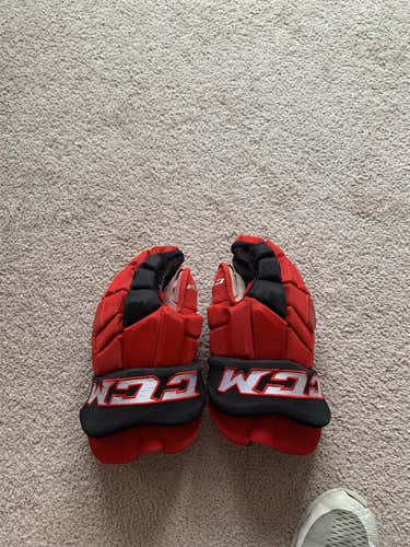 Red Used CCM 15" Pro Stock Gloves