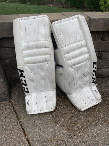 White Used Intermediate 28 + 1 CCM Eflex3 Goalie Leg Pads