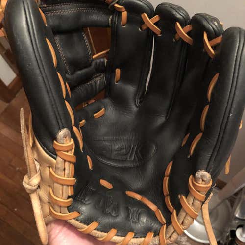 Cleaned, Conditioned, Relaced Wilson A2k 11.75 1787