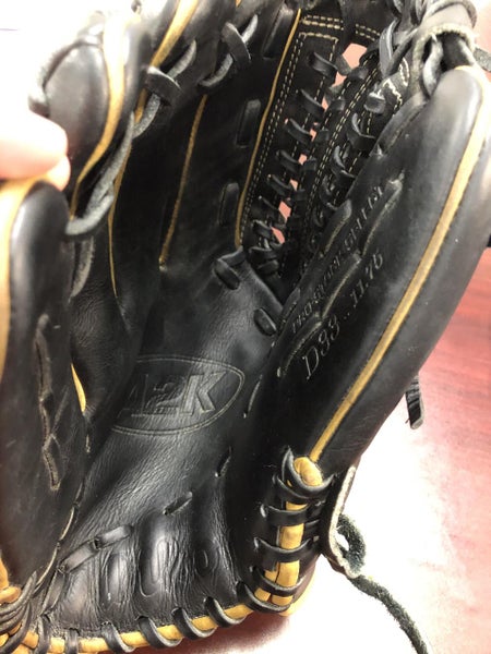 Black Used High School/College Wilson Left Hand Throw Pitcher's A2K Baseball Glove 11.75"