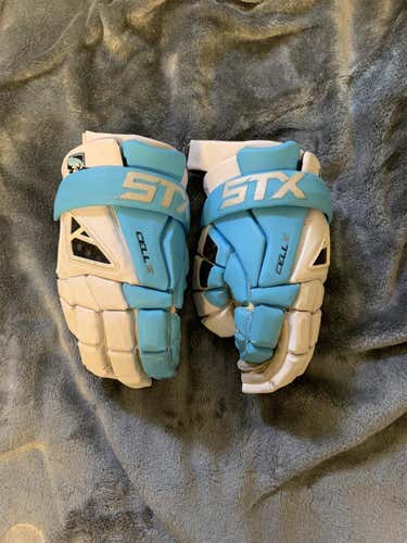 Carolina Blue and WhiteUsed Player's STX Cell IV 13" Lacrosse Gloves