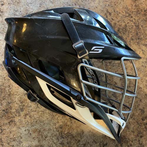 Used Cascade S Helmet. black shell. white chin & washer, black chin strap. normal signs of use.