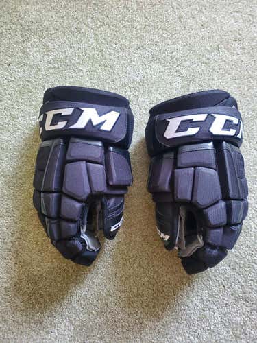 Used Black CCM  Crazy Light Prostock Gloves 14 in.