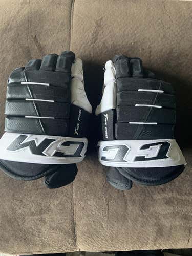 Black Used Senior CCM Tacks 4 Roll Gloves 14"