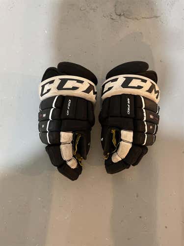 Black Senior CCM Tacks 4 Roll Pro 14"  Gloves