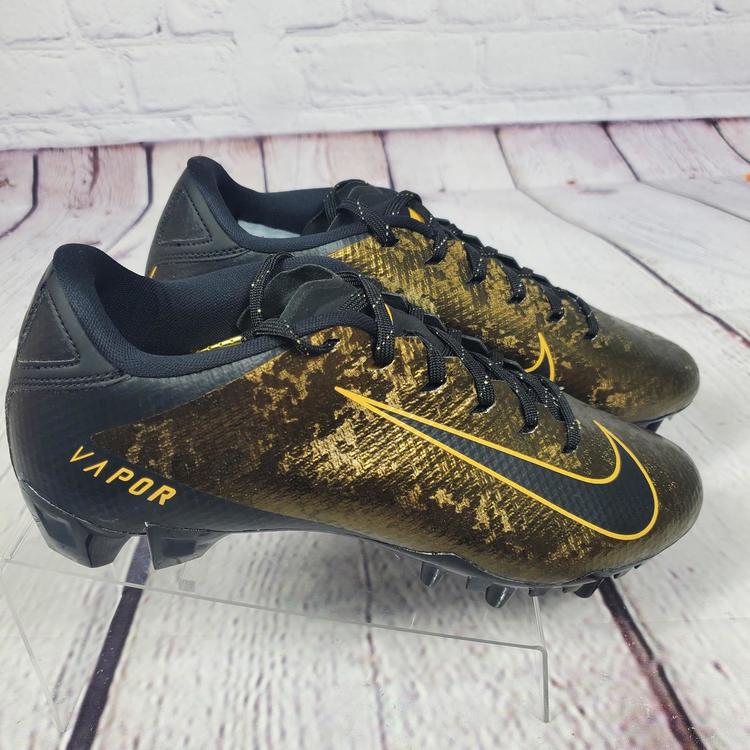gold untouchable cleats