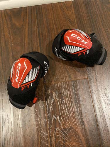 Used Youth Medium CCM JetSpeed FT1 Elbow Pads & Bauer Supreme 150 shin guard 9”