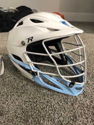 White and blue Used Adult Player's Cascade R Helmet with black or white chin strap