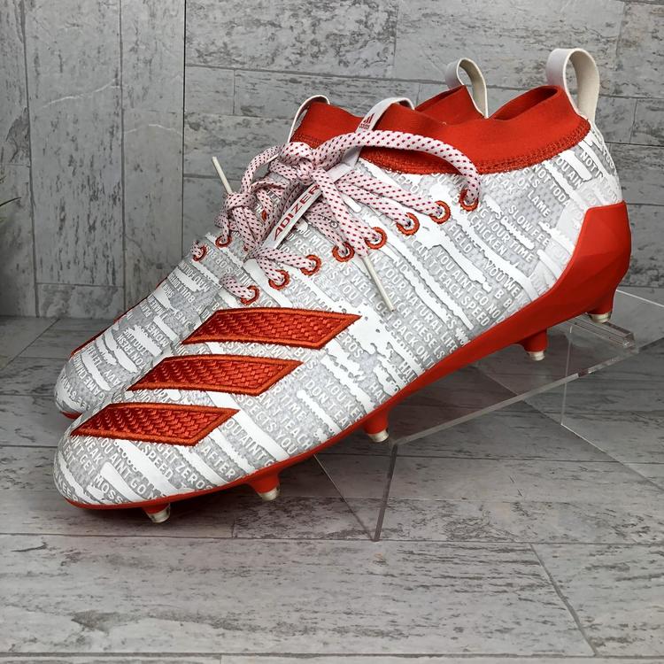 orange adidas football cleats