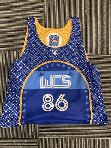 WCS Pinnie, size L, reversible Blue/Gold