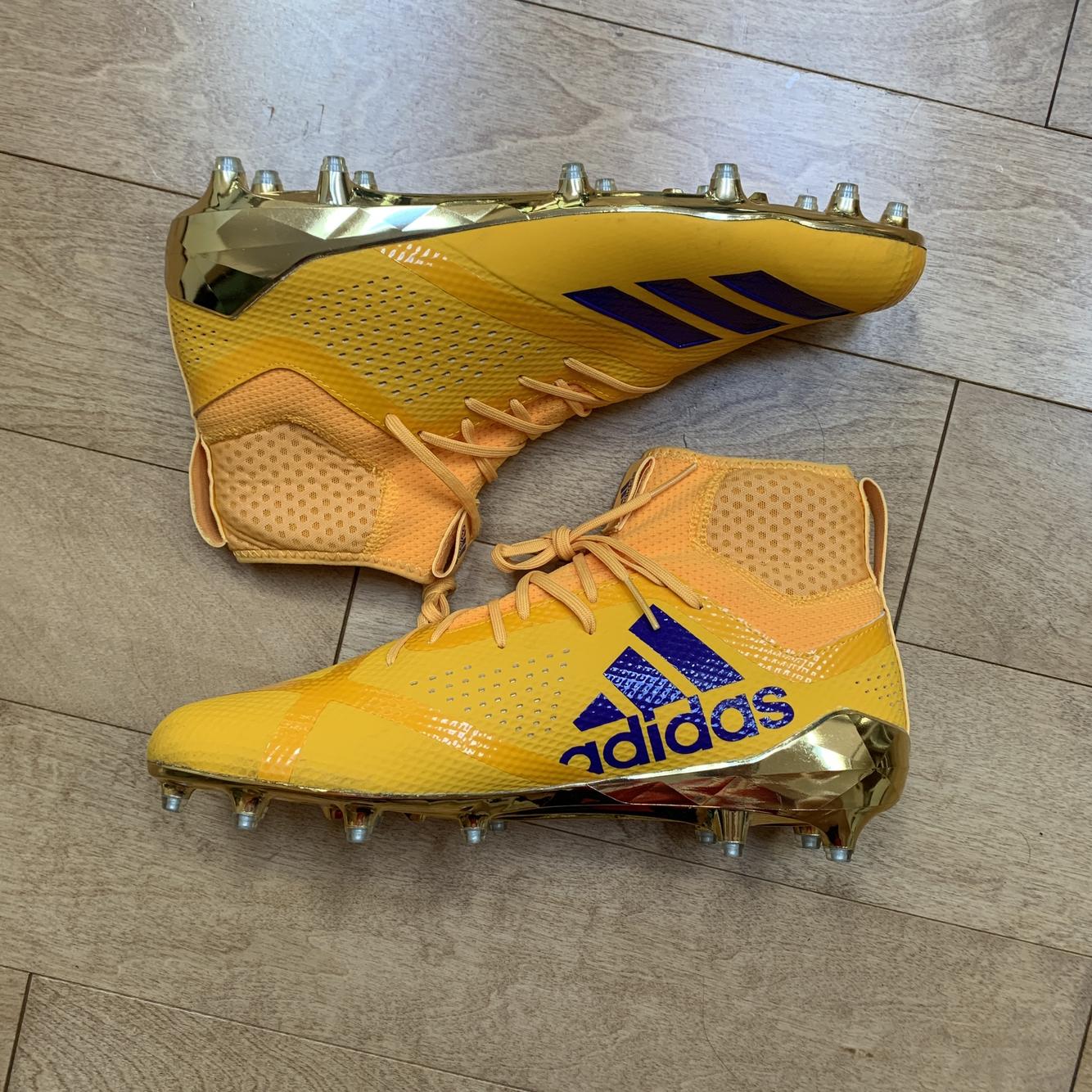 purple adizero football cleats
