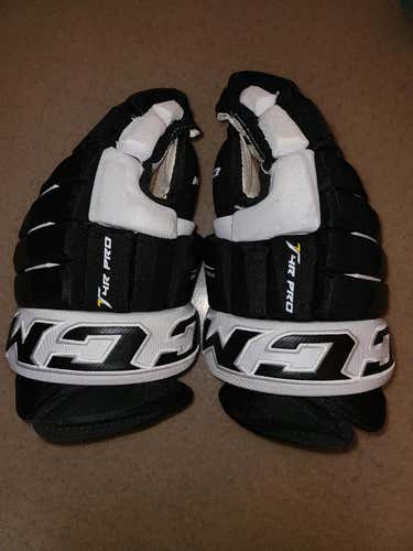 Black Used Senior CCM Tacks 4 Roll Pro Gloves 14"
