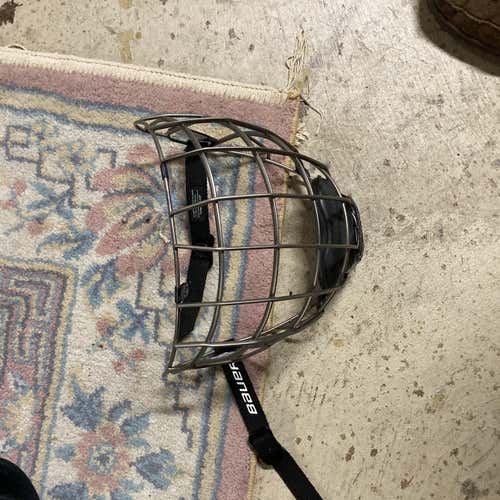 Used Medium Bauer Re akt cage only Helmet