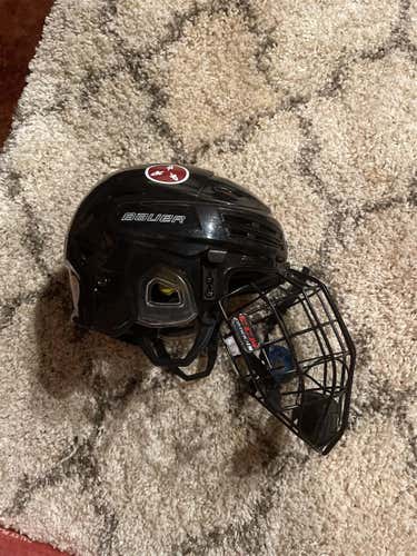 Black Used Large Bauer Re-Akt 200  Helmet