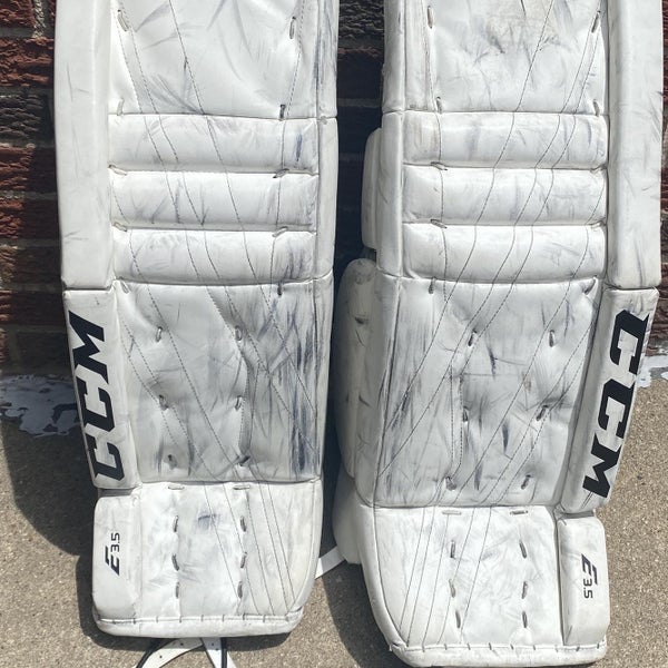 White Junior 28" CCM Extreme Flex E3.5 Goalie Leg Pads