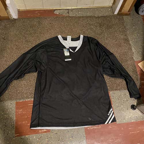Brand New Black Adult Small Reversible Jersey