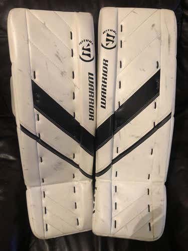 White Used Junior 26" Warrior Ritual G4 Goalie Leg Pads