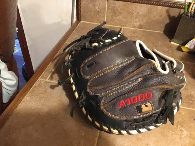 Gray Used Wilson Right Hand Throw Catcher's A1000 Baseball Glove 33"