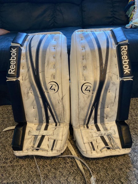White Used 24" Reebok Premier 4 14K Goalie Leg Pads