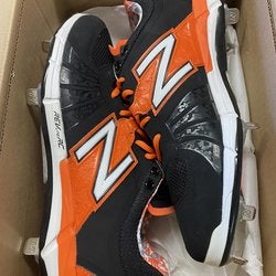 New balance 12.5 metal cleats new in box never worn