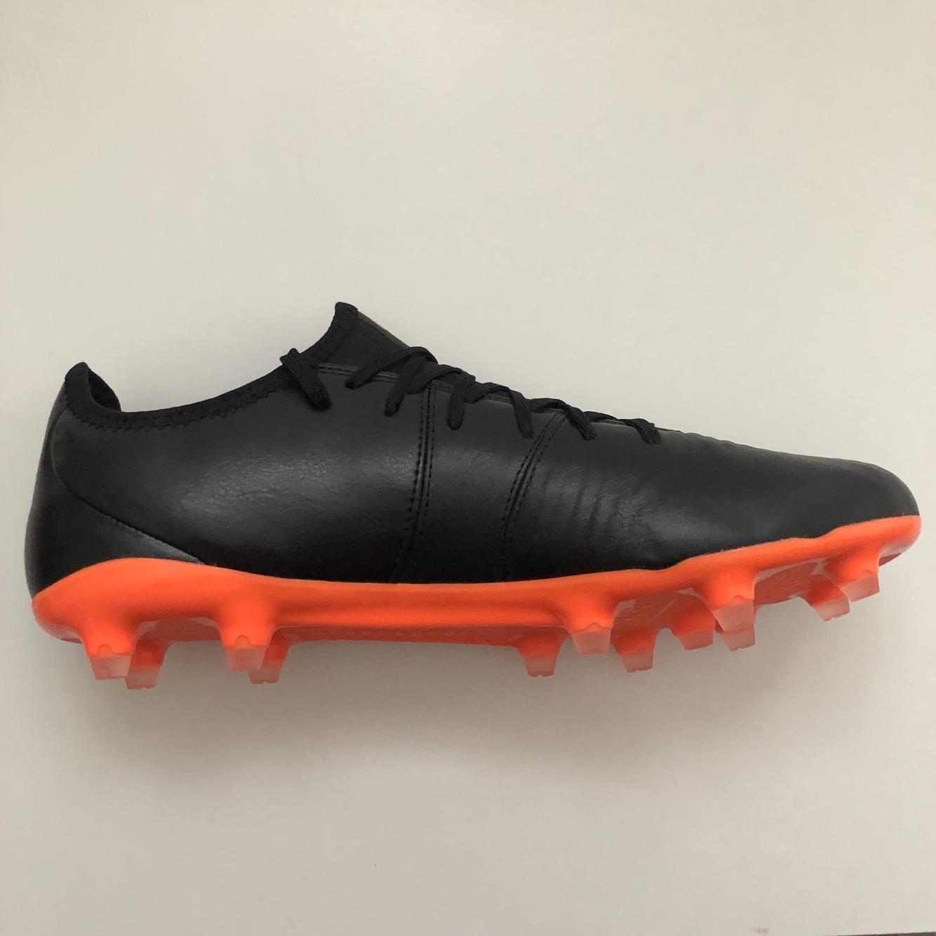 orange puma cleats