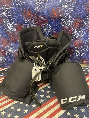 Black Lightly Used Senior Large CCM AS1 Hockey Breezer Pants-164818