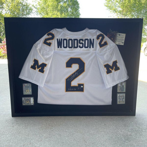 Charles Woodson Autographed Jersey