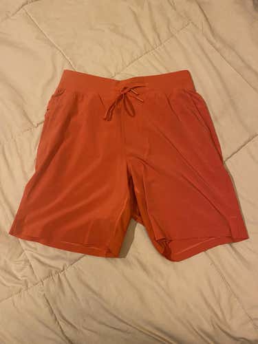 Orange lululemon men’s T.H.E. Short 7” small
