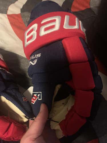 Team USA 15” Nexus 2N Bauer gloves, newly repalmed with 14” palm