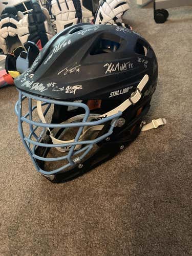 UNC Team issued helmet signed by whole team