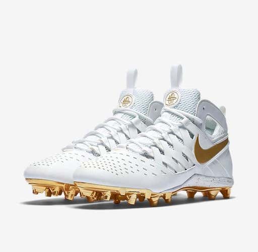 Brand new Size 8.0 (Women's 9.5) Nike Huarache white and metallic gold cleats.